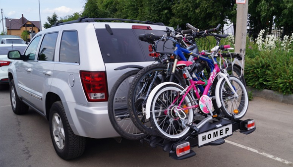Перевозка велосипедов: фаркоп vs крыша vs салон — штрафы, аэродинамика